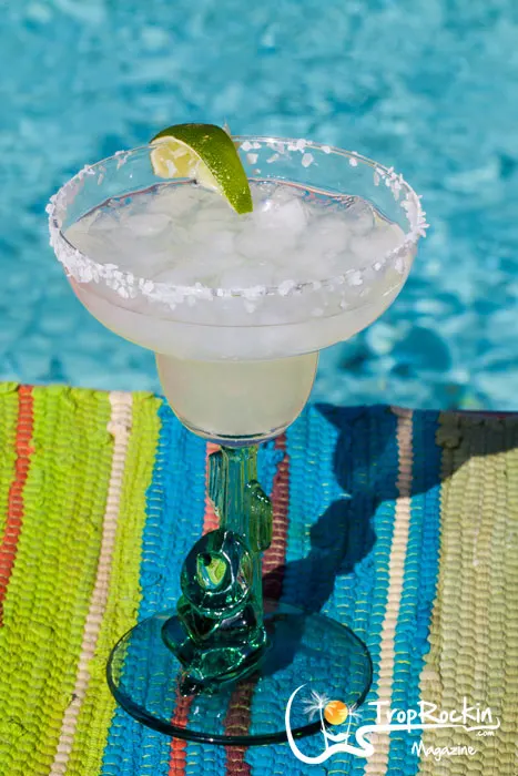 Margarita with lime and salt rim by the pool.