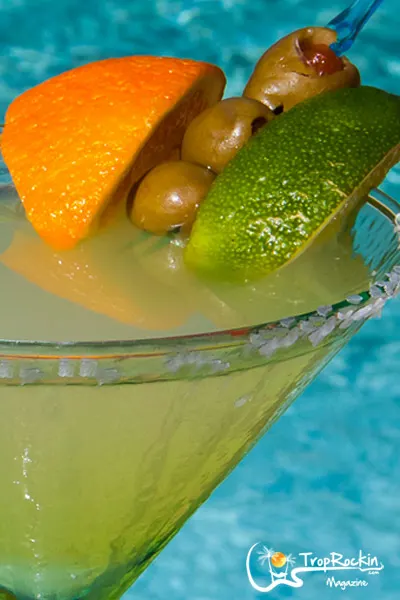 Mexican Martini close up of garnish of orange olives and lime