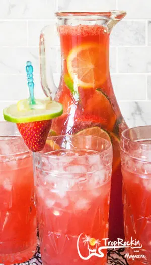Strawberry Rum Punch Pitcher with Filled Glasses