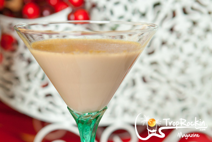 Upclose Triamisu Martini in a prretty martini glass with a Christmas background.