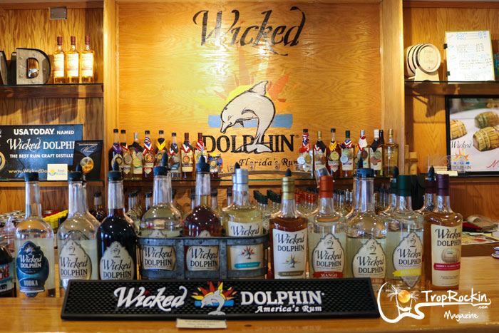 wicked dolphin rum distillery counter with liquor bottles