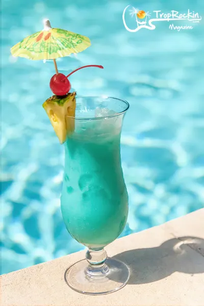 Blue Hawaiian tropical drink by the pool.