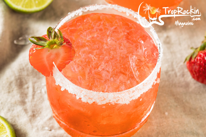 Fresh Strawberry Margaritas in a glass with a salty rim.