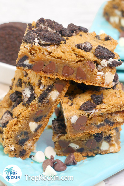 Oreo Blondies stacked on plate.