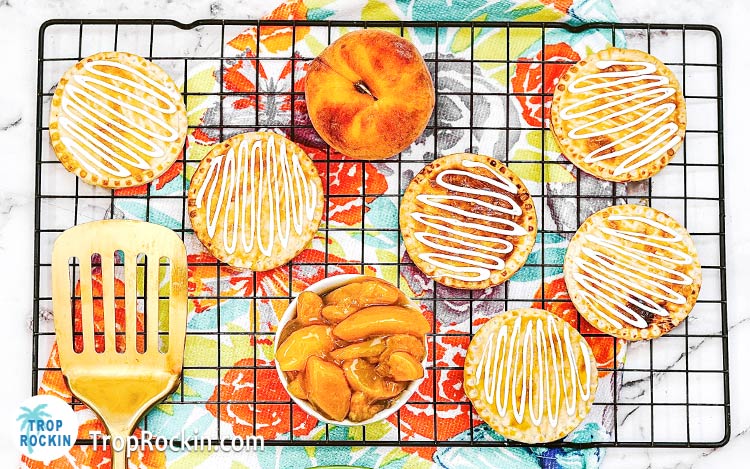 Air fryer peach hand pies with icing.