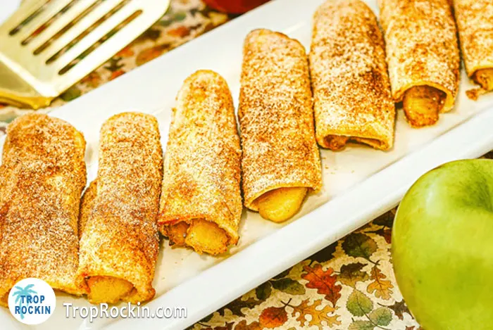 Air fryer apple pie roll ups on serving tray.