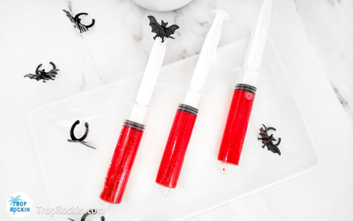 Halloween Shots in Syringes on a serving tray.