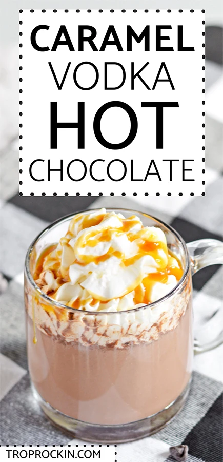 Mug of hot chocolate with vodka, topped with whipped cream and caranel sauce with recipe title on top for pinterest pin.