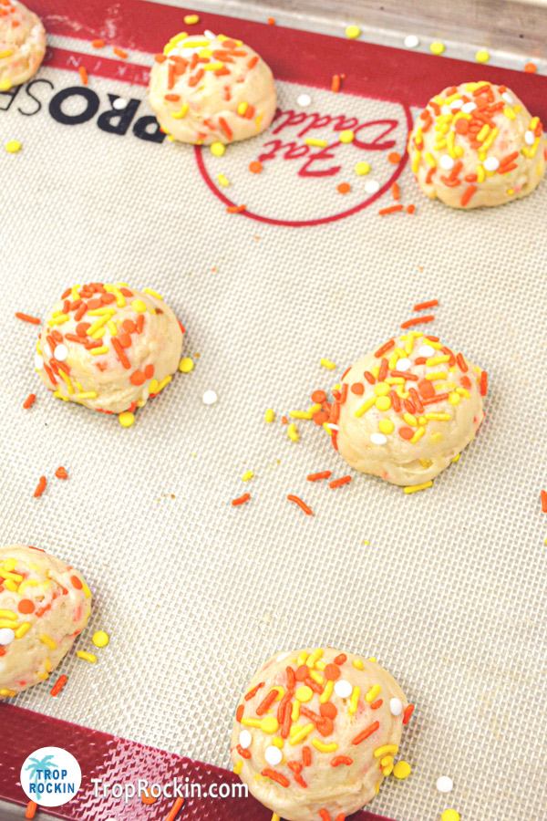 Halloween Cake mix cookie dough balls on baking sheet.