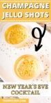 Two champagne jello shots with gold sprinkles on platter with title on top for pinning to pinterest.