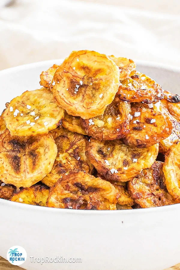 Close up view of banana chips in a bowl.