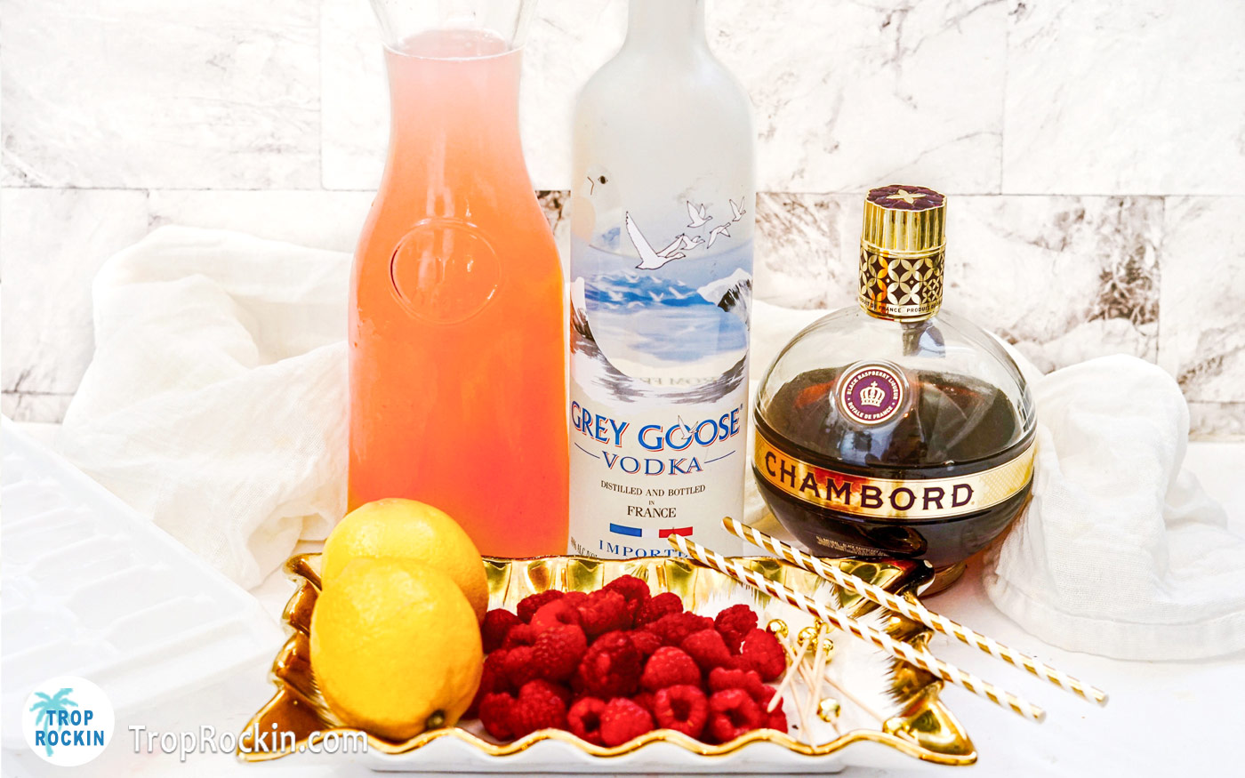 Vodka Raspberry Lemonade ingredients displayed on counter top.
