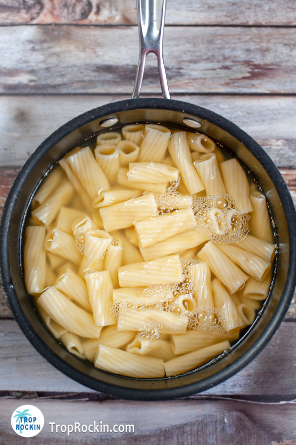 Large pot of cooked pasta al dente.