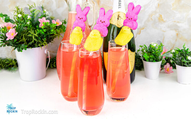 Easter mimosa with peeps garnish on a straw.