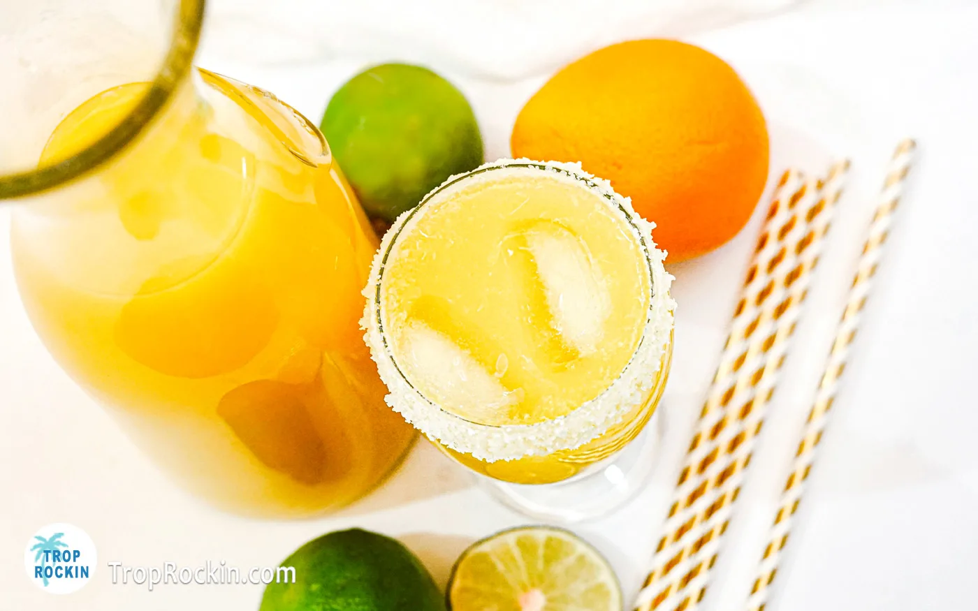 Top view of cocktail glass filled with tequila and orange juice.