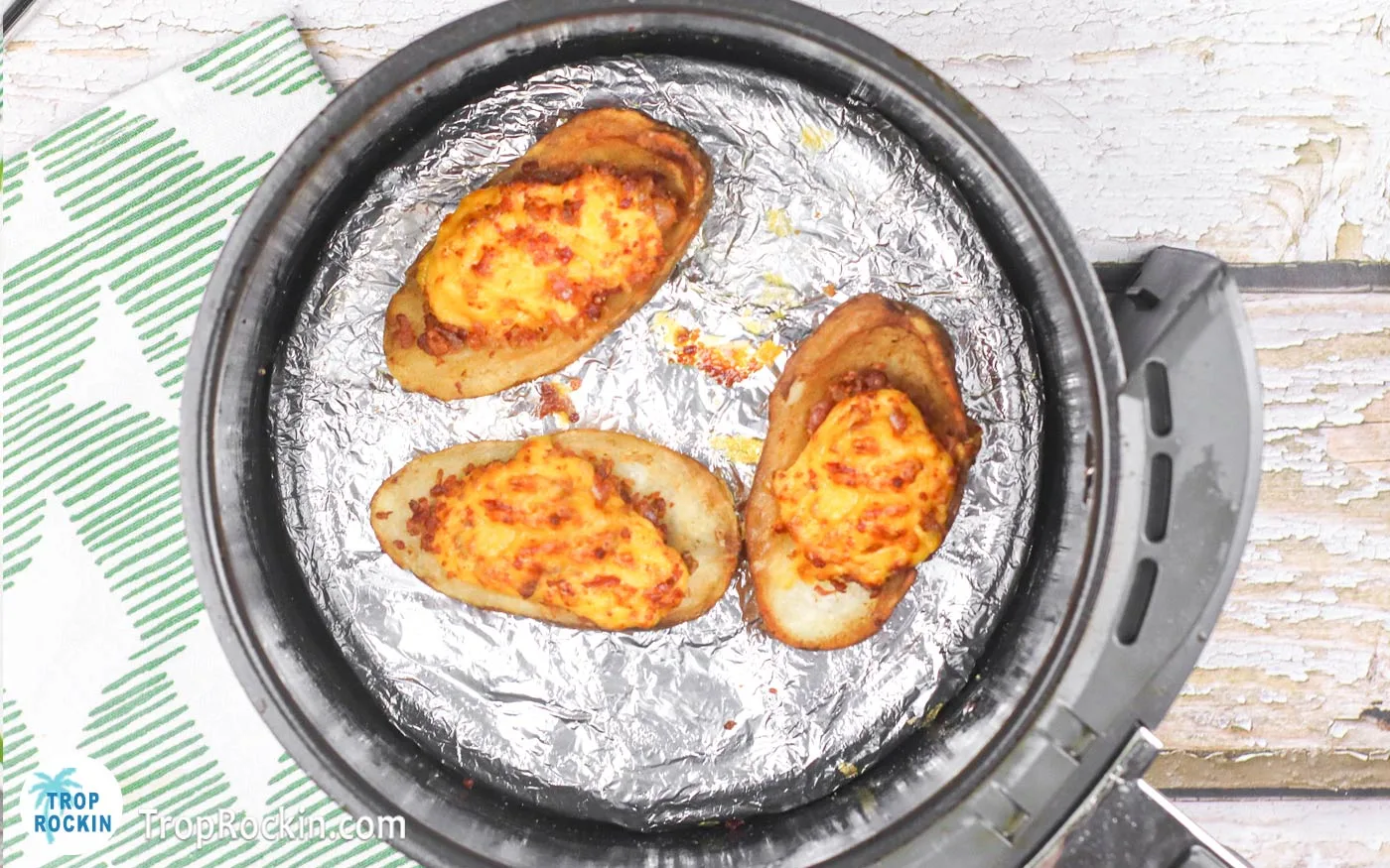 Frozen Potato skins in air fryer after cooked.