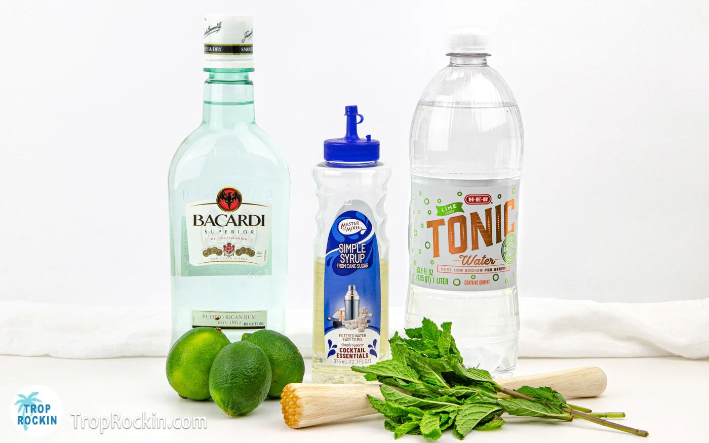 Mojito Recipe with Simple Syrup ingredients line up on counter top.