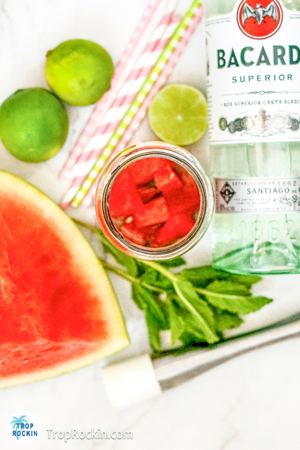 Watermelon cubes added to the glass mason jar.