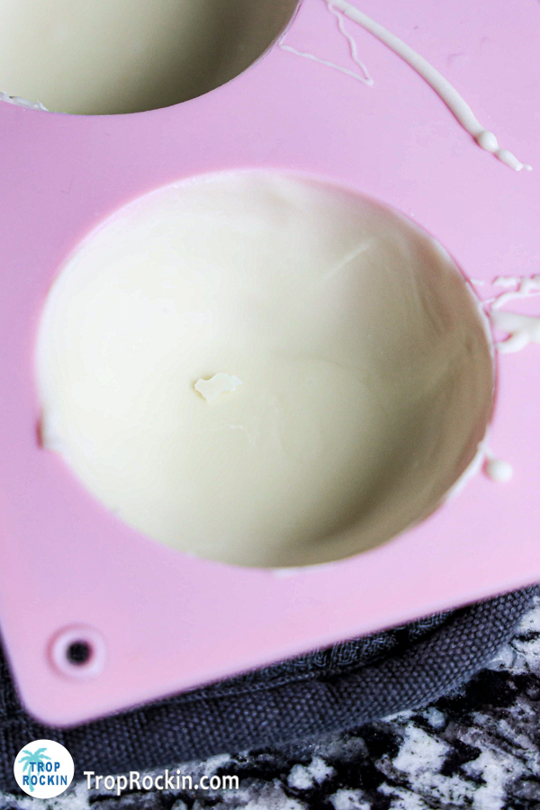 Hardened melted white chocolate in a silicone mold