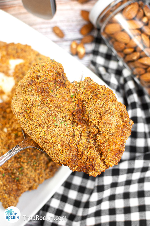 Close up of a an air fried almond crusted chicken breasts.