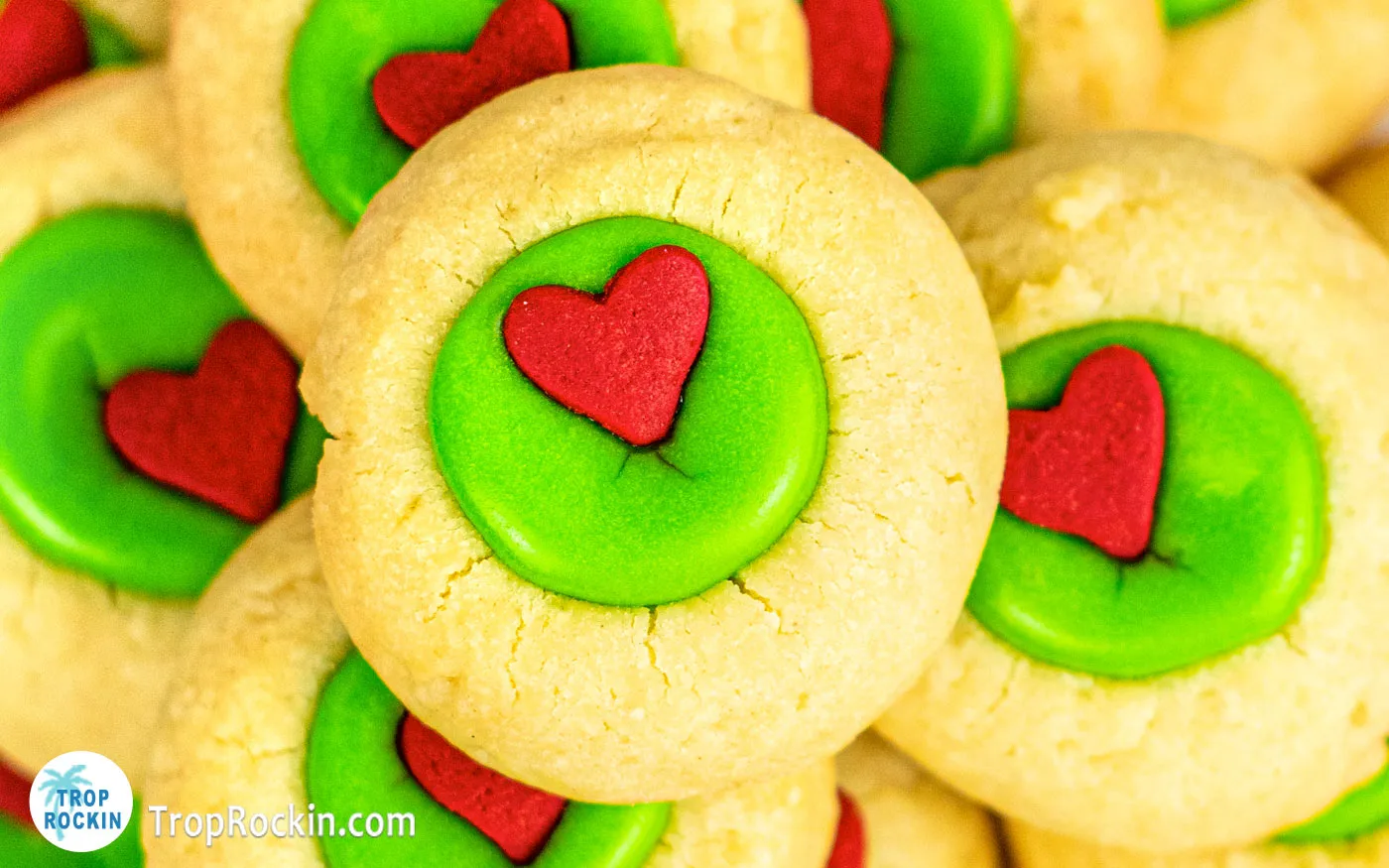 Grinch Thumbprint Cookiestop view of a pile in a bowl.