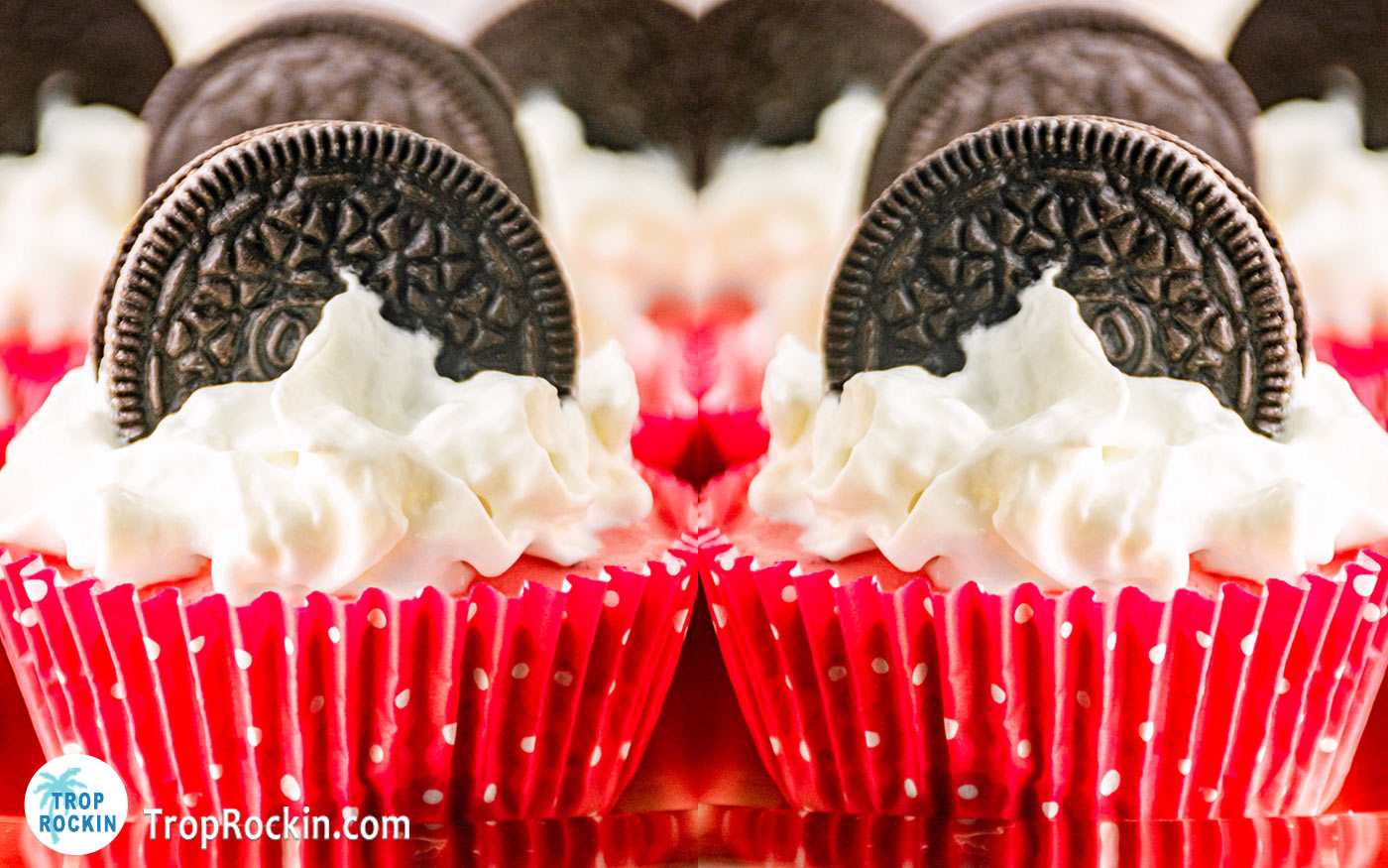 Plate of mini red velvet oreo cheesecakes with two up close.