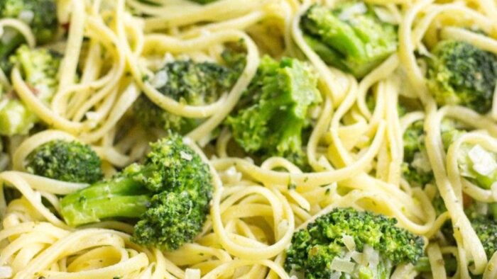 Pasta with creamy sauce and broccoli.