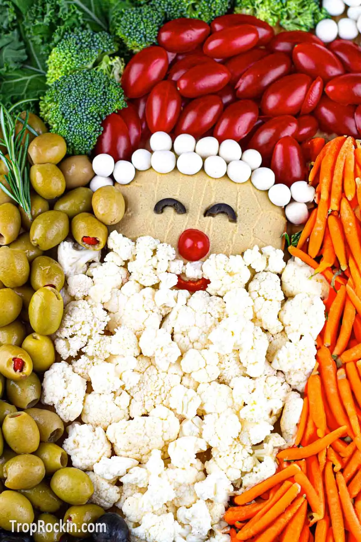 santa veggie tray in the shape of a snta claus face.