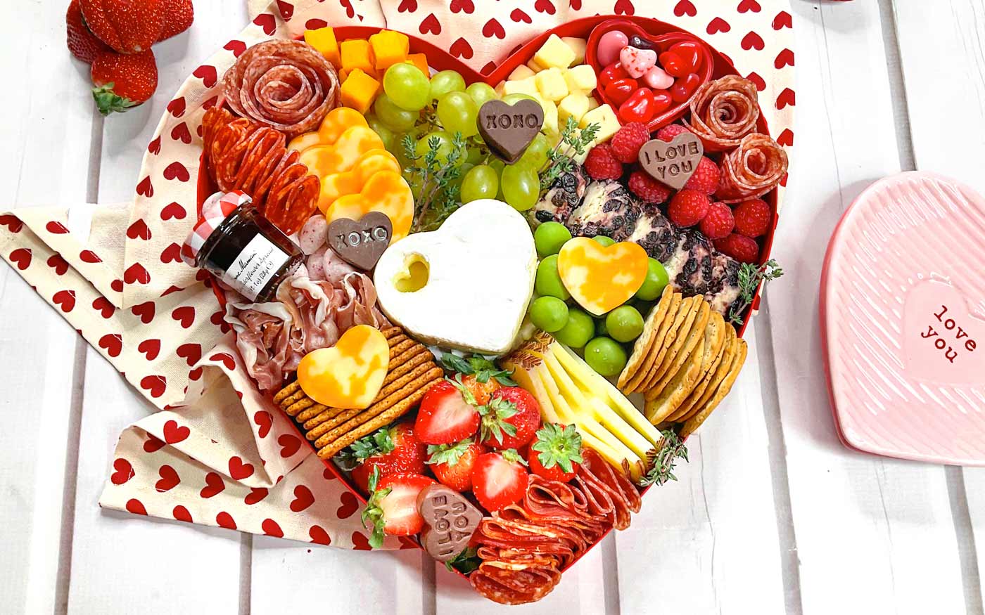 Valentine's Day Charcuterie Board in a heart-shaped container.