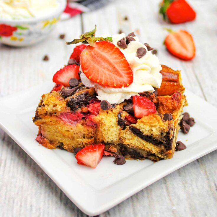 Strawberry french toast bake slice on plate.
